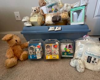 10 pair of baby doll shoes, socks, tights, (1) babydoll (2) bags of weight stuffin, (3) bags of wavy locks, (8) baby doll patterns, (5) stuffed animals