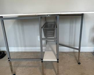 Rotary cutting desk 38x58 closed 12x38 but height can go down to 28 inches / Rotary cutting 38x26