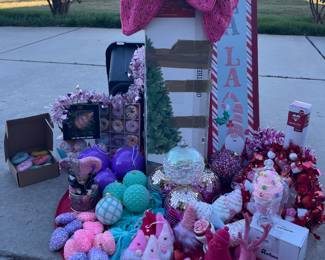 (12) Christmas birthday party decor, (3) pink stockings, (1) cupcake topper, (4) teal ornaments, (5)teal ornament bows,  (1) Albany Tree on 95 cm, (12) pink and purple litter clip on hearts, (3) purple glass ornaments different sizes, (4) pink ornaments, (5) gnomes, (4) for sequence large balls, (4) cupcakes, (5 ) ice cream cones (1) XOXO cup, (1) valentine tree, (1) heart wreath, (1) ice cream cone string, (12) doughnut, ornaments, (1) Tree skirt one side is valentines. The other side is St. Patrick's.