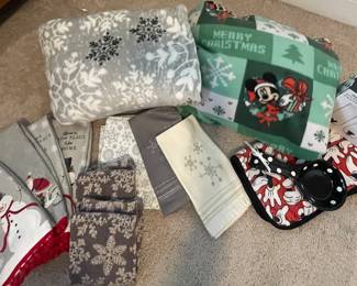 Snowflake Throw, Minnie Christmas blanket, (2) Minnie drinking cups, (1) polka dot oven spoon, (1) mickey's hand dish dryer mat, (2) snowflake pillow cases, 