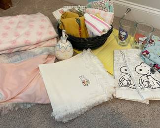 (2) multi pastel shaggy colors pillow cases, (1) bunny throw, (4) yellow placemats, (8) white shaggy bunny napkins, (2) snoopy hand towels, (2) snoopy Easter drinking cups, (2) Mickey blue pillow cases, (9) Easter hand towels, (1) Easter soap dispenser 