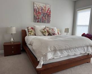King size bed with Simmons box spring and mattress. (Bedding, lamps and nightstands are separate lots).