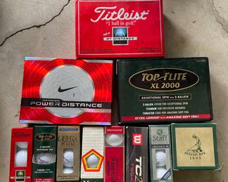 Large collection of golf balls: Titelist, Top Flight, Nike, Wilson, Master & more