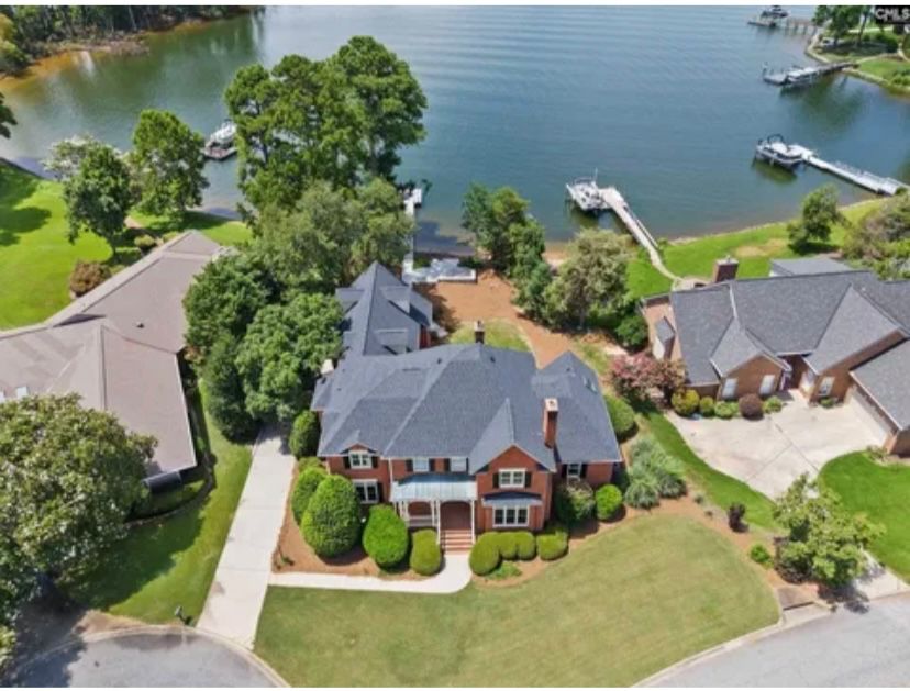 THIS EXECUTIVE HOME ON LAKE MURRAY IN CHAPIN SC 29036 IS FOR SALE. OFFERED AT 1,385,000. AGENTS PAM LAWSON AND SHELLY SIMS WITH HOME ADVANTAGE REALTY.