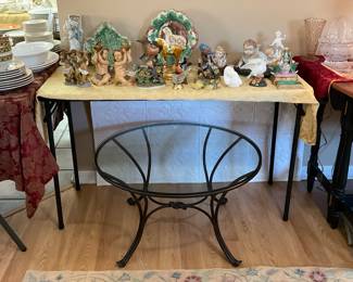 Black iron base with glass tabletop sofa table