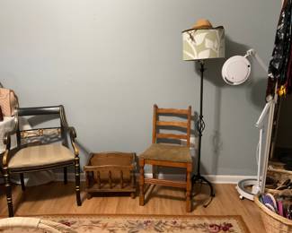 Chairs and lamps and rug