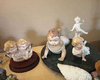 Beautiful pieces of bisque porcelain piano babies