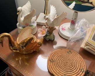 hand mirror in stand; hobnail lamp, birds
