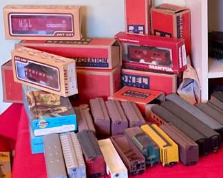 Train cars and parts, many in boxes. Also have empty boxes for some