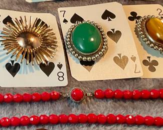 red crystal necklace, broaches
