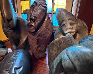 Shona Stone .. These are beautifully handcarved Shona serpentine spirit statues from Zimbabwe Africa.  We have maybe a dozen pieces left.  These pieces were saved from a few large shipments late 1990s.  These fear pieces were in storage for the last 25 years. We saved them for display, showing the diversity of the stones, color and design.  We closed our store in chagrin Falls, Ohio in the year 2000. 