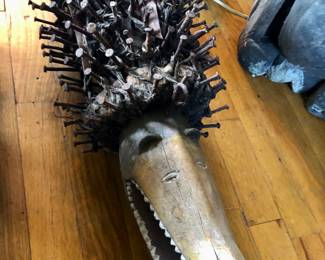 Ritual protector, are fabulous carving is rusted with nails and metal objects.  Statue used to counter soul stealing and witches spells....... an item used to protect a home or village or individual