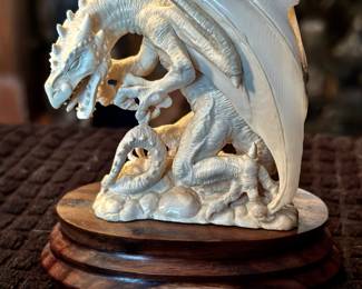 Amazing fossil ancient mammoth hand carved dragon. We have beautiful, fossil, pendants, and many more statues. Retrieved from the permafrost in Alaska.  