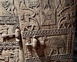 An amazing pair of African Senfu tribe room doors, solid wood hand carved early 1900s