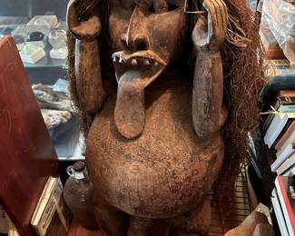 Lol   I always say he's from the Viagra tribe....   He is huge in all aspects. He is about 3 feet tall with a full head of Rafia hair going behind him down to the floor an amazing antique piece.    This is a very large statue and heavy... Obviously he's a fetish piece from Africa possibly the Congo..   I've had smaller versions of this, but never anything this totally amazing... 