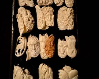 A beautiful collection of bone carvings. I spirit pendants are all hand carved and ready to hang on a cord or a chain many designs featuring animal and goddess theme.  We also carry some of these designs in an ancient fossil mammoth and walrus, which is thousand year-old material. {not in photo}