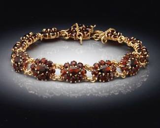 Ladies Gold and Garnet Floral Design Bracelet
