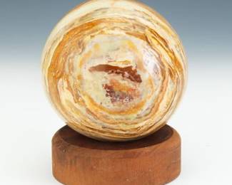 Carved Onyx Specimen Sphere on Wooded Stand