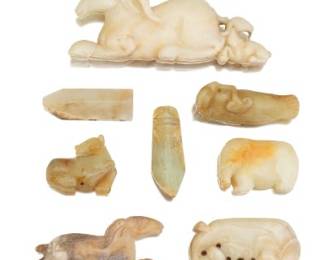 A Group of Eight Carved Jade Ornaments