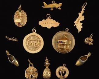 Collection of Thirteen Gold and Gem Stones Charms