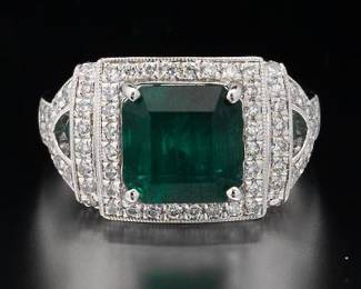 ,950 Platinum Emerald and Diamond Retro Style Head