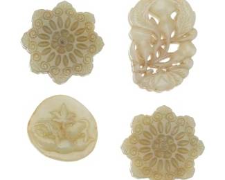 A Group of Four Carved Jade Ornaments