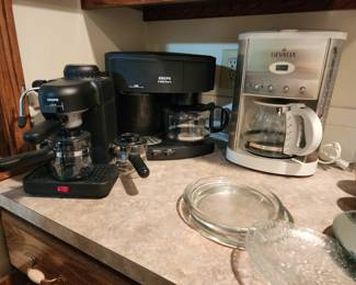Espresso machines and a coffee pot