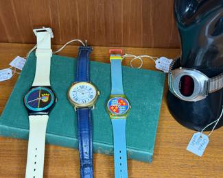 Vintage Watches 
 (Left to right) Swatch Watch, Guess Watch, Swatch Watch, Litronix