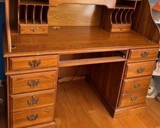 Oak finish roll top desk $100