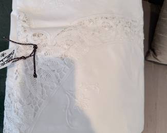 Beautiful Battenburg white freshly laundry $20 absolutely breathtaking. It's for a rectangular table.