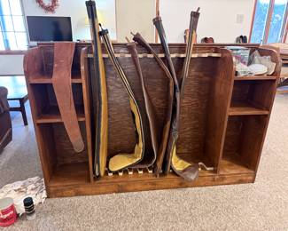 Gun covers and Nice wood Gun Cabinet