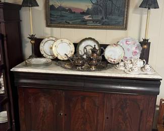 Empire sideboard with marble top, lamps, artwork, china, silver plate tea set
