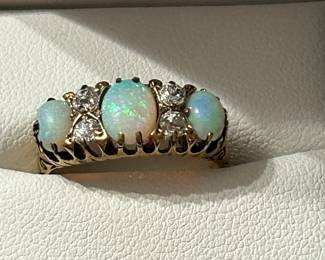 Stunning 12k gold opal and diamonds ring