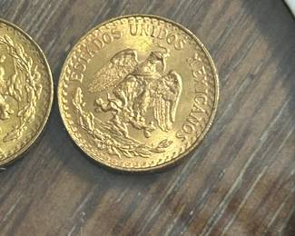 Gold peso coins 