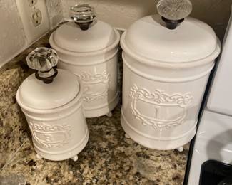 Decorative ceramic canisters with glass knobs