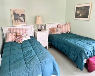 White twin beds.  LL Bean down comforters.