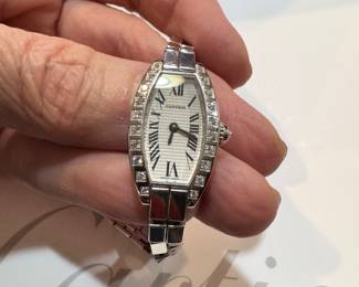 Cartier Mini Tonneau 18K white gold watch with box, paperwork, and extra links.