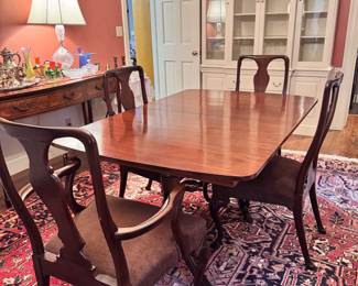 Dining table with 3 extensions and chairs