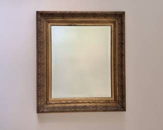 Gold-framed mirror