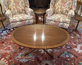 Kittenger oval pedestal coffee table