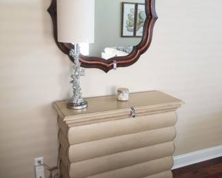 Large mirror; faux coral silver table lamp; sideboard