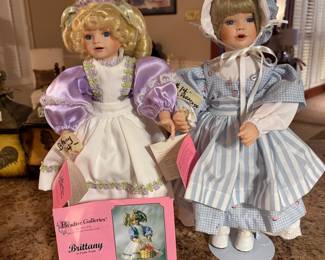 A sample of many porcelain dolls. All are in perfect condition
