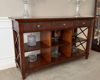 Mahogany buffet with storage shelves and drawers. Also  Two crystal candelabras.