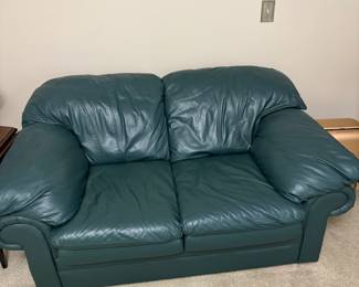 Perfect condition leather love seat.