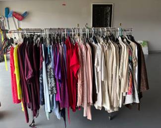 Ladies tops and sweaters lightly warn. Large and X Large