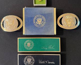 Vintage White House belt buckles, deck of cards, Jimmy Carter lapel pin, Jimmy Carter pen in box and Walter Mondale pen in box