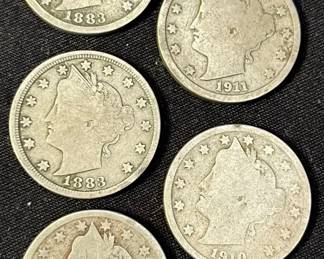Liberty Head “V” Nickels – 1883 (With Cents), 1895, 1910, 1911 (5 Coins Total)
A handsome group of five Liberty Head “V” Nickels spanning nearly three decades of U.S. minting history. Each coin displays the classic Charles E. Barber design featuring Lady Liberty on the obverse & the bold Roman numeral “V” on the reverse.

• (2) 1883 “With Cents”
• (1) 1895
• (1) 1910
• (1) 1911
• Please see pictures for condition & detail
