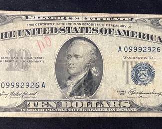 Miscut 1953 $10 Blue Seal Silver Certificate – Error Note
Series 1953 $10 Silver Certificate featuring Alexander Hamilton on the front and the U.S. Treasury Building on the reverse. This note shows a noticeable miscut/off-center print, adding extra collectible appeal for paper-money enthusiasts. Blue Treasury seal and serial number A09992926A visible on front.

• Series: 1953
• Blue Treasury seal & serial number: A09992926A
• Miscut/off-center printing
• Please see pictures for condition & wear
