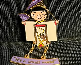 Disney “It’s A Small World” Enamel Pin
Charming Disney enamel pin inspired by the beloved It’s A Small World attraction—one of Walt Disney’s most iconic park rides. Features vibrant international colors & whimsical design reflecting the unity theme that’s captured hearts since its debut at the 1964 World’s Fair.

• Classic It’s A Small World design
• Bright enamel detailing with gold-tone finish
• Standard Mickey-head clasp
• Please see pictures for measurements & condition
