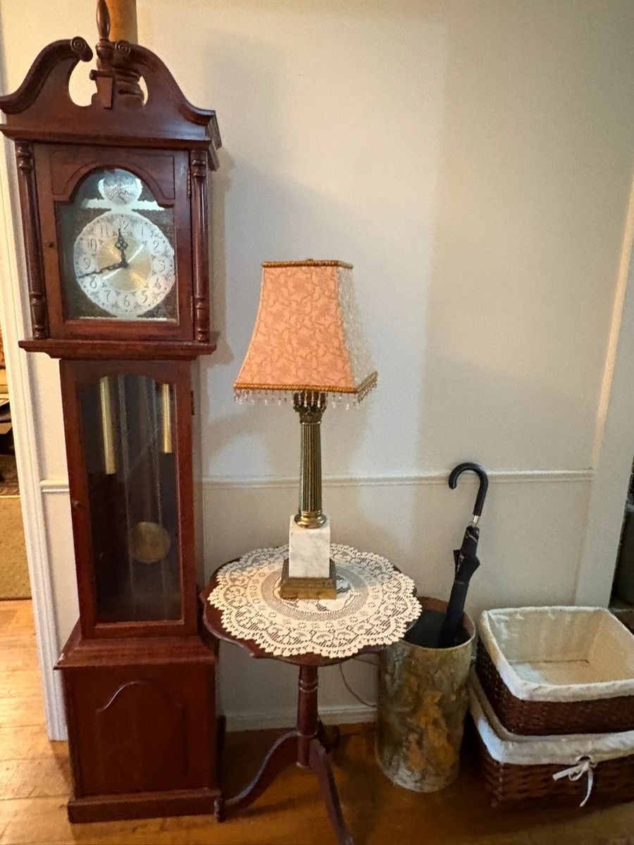 Grandmother clock, side table, baskets,